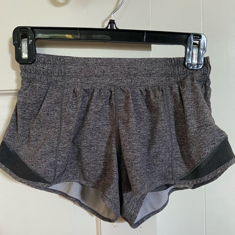 Hotty Hot Low-Rise Lined Shorts 2.5 inch in the color Heather Lux Muli Black